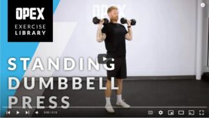 Standing dumbbell press by: OPEX Fitness
