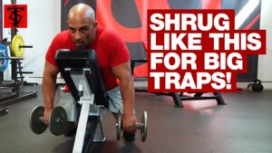 Dumbbell chest supported incline shrug by: T Nation
