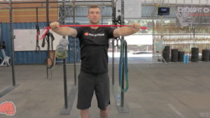 How to Warmup Shoulders with Resistance Band by: WOD Nation