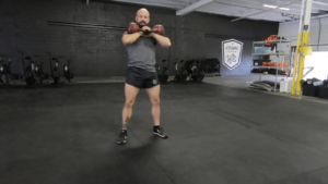 How to do a Kettlebell Front Squat by: Atomic Athlete