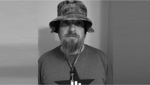 Coach Matt Henigsmith by: US Army 
